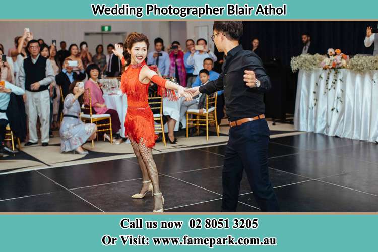 Photo of the Bride and the Groom dancing on the dance floor Blair Athol NSW 2560