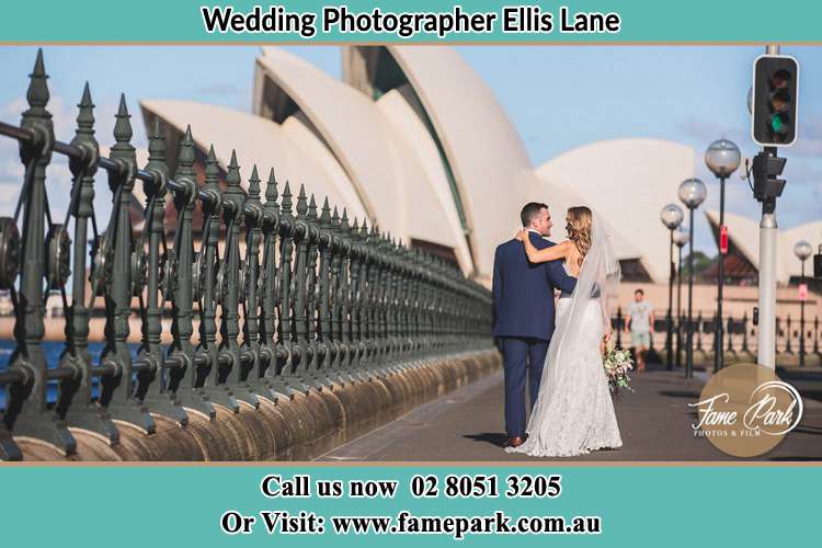 The Groom and the Bride walking towards the Sydney Grand Opera House Ellis Lane NSW 2570