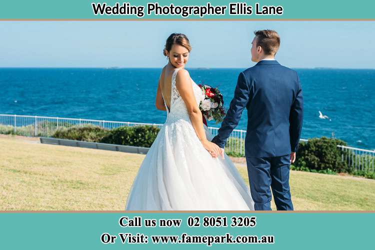 Photo of the Bride and the Groom holding hands at the yard Ellis Lane NSW 2570