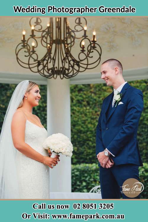 Photo of the Bride and the Groom happily looking each other Greendale NSW 2745