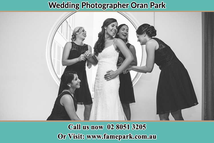 Photo of the Bride and the bridesmaids near the window Oran Park NSW 2570