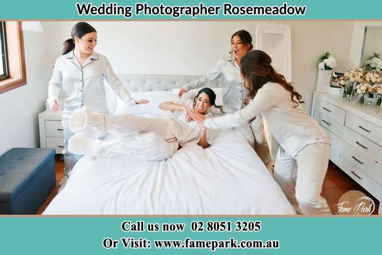 Photo of the Bride and the bridesmaids playing on bed Rosemeadow NSW 2560