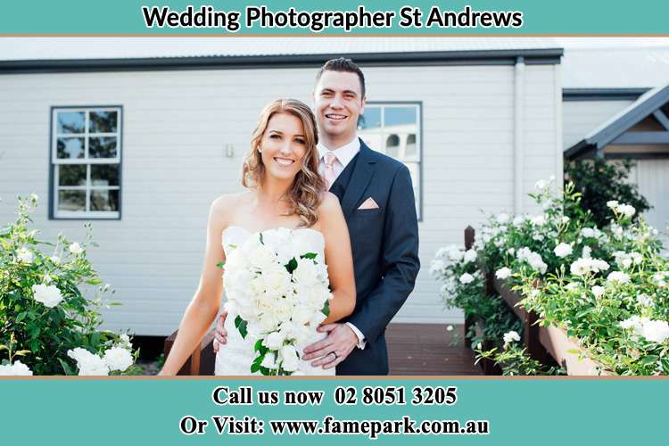 Photo of the Bride and the Groom at the front house St Andrews NSW 2566